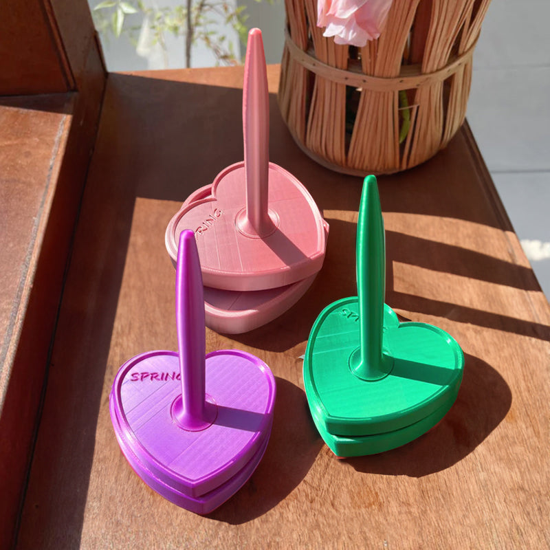 Vertical Shiny-Design Yarn Spinners and Holders