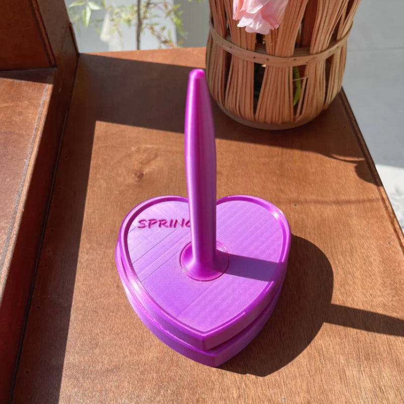 Vertical Shiny-Design Yarn Spinners and Holders